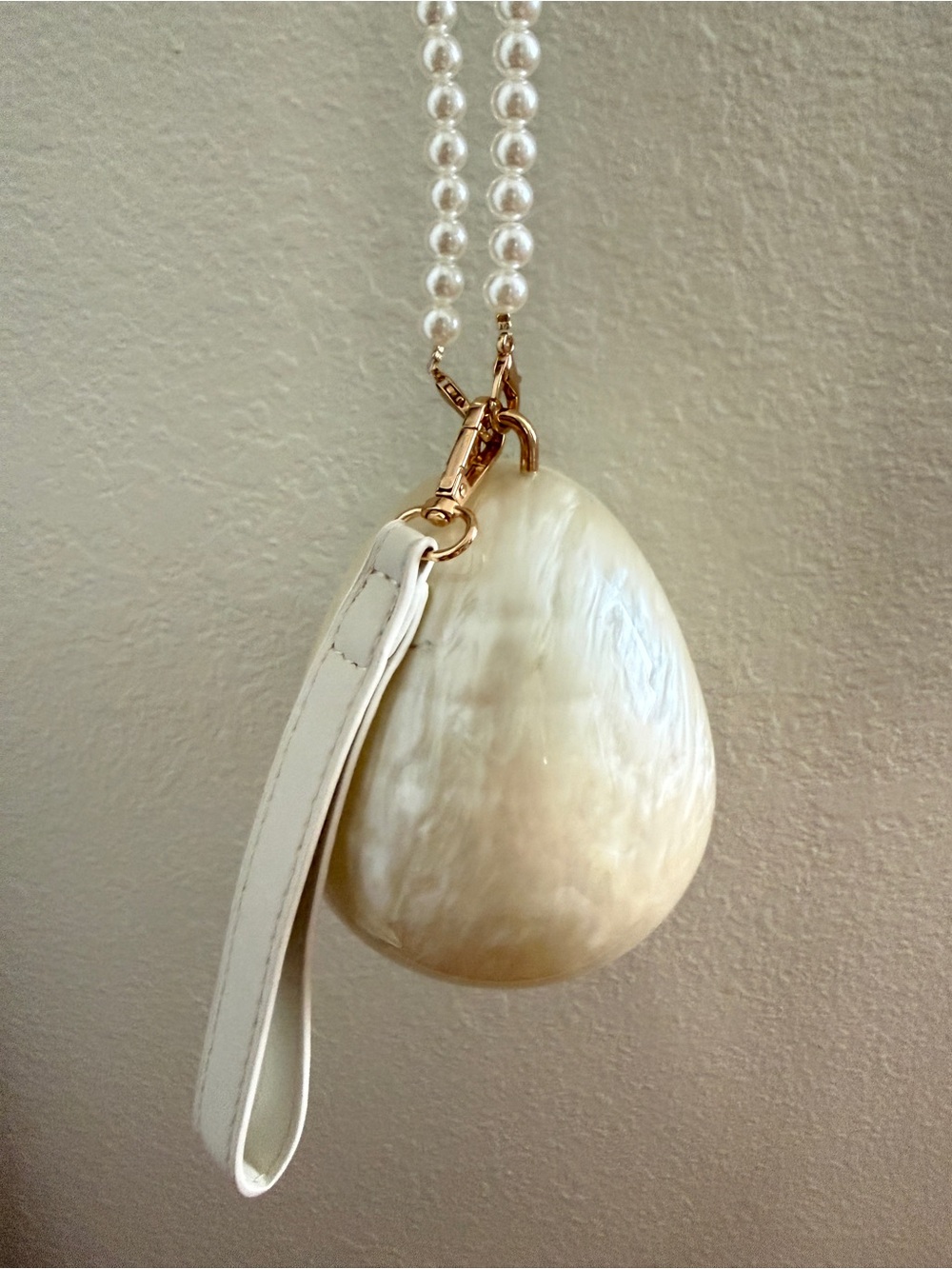 Pearl-Effect Cream Egg Clutch with Pearl Strap